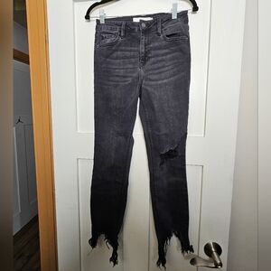 High-Rise Black Skinny Jeans with Distressed Knee and Frayed Hem